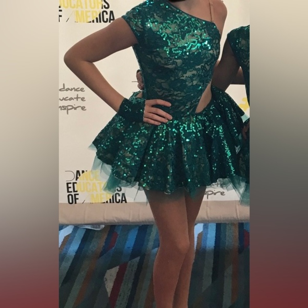 Green sequin jazz costume with hair accessory and gloves